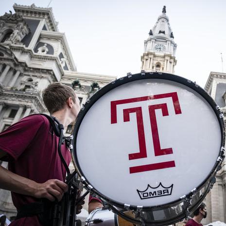 the Temple marching band performing in front of Philadelphia's city hall.